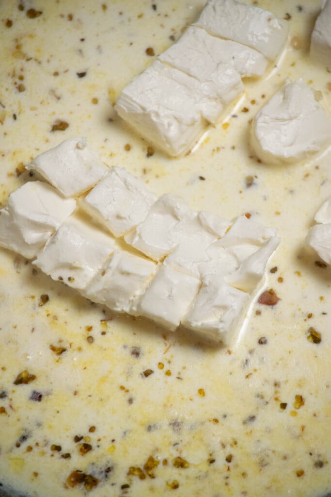 add in the softened, cubed cream cheese. 