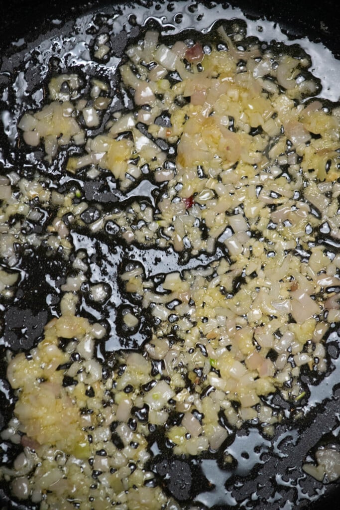 melt butter over medium heat in your saut&eacute; pan, and and add shallot and garlic. Cook a few minutes, until softened and fragrant, stirring occasionally to prevent browning.