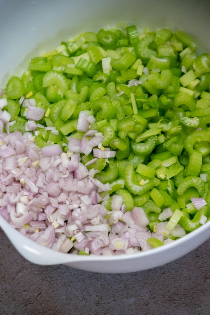 dice the shallots, and cut the celery ribs into &frac14;" thick slices, reserving the leaves for later