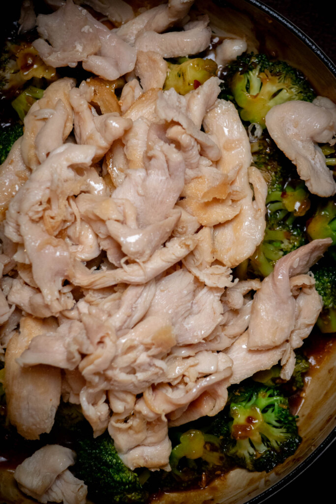 add reserved cooked chicken and any juices back to the pot with the broccoli 