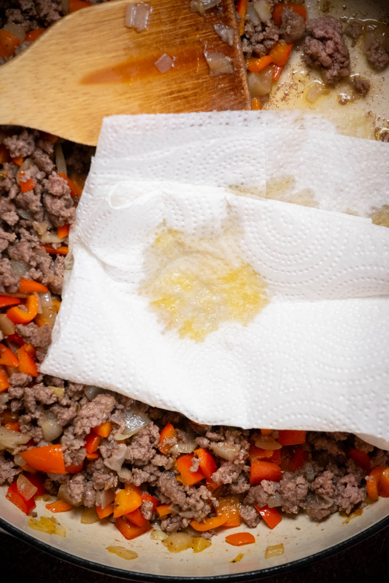 Cook beef, breaking up as you go, until cooked through, and no pink remains. Use paper towels to drain off the excess grease from the skillet. 