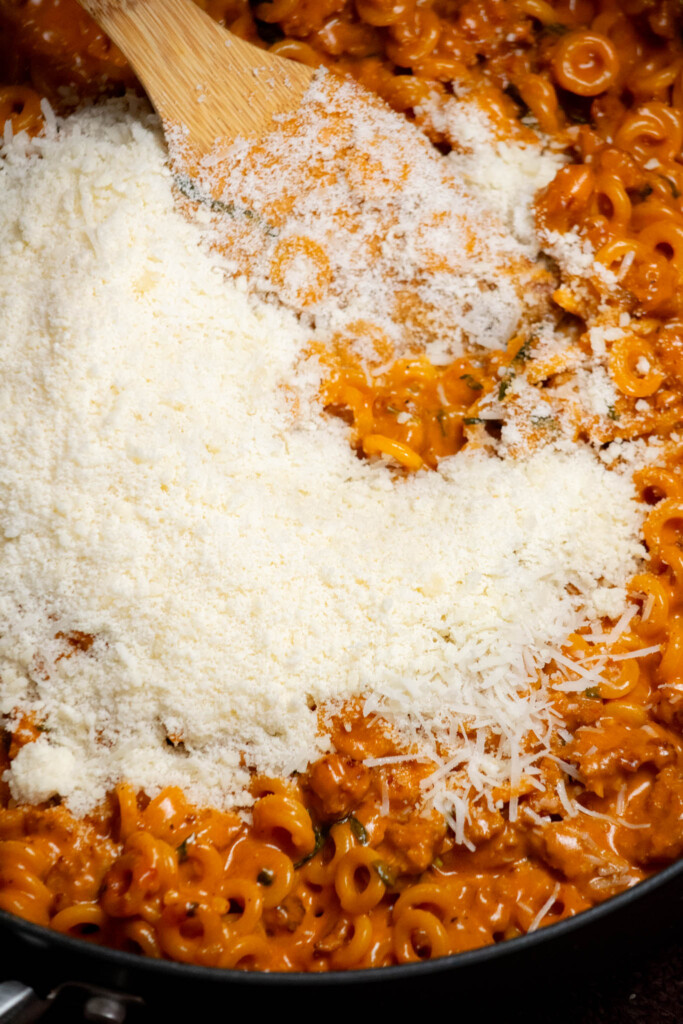 Once creamy and the pasta is cooked through, turn of the heat and stir in the Pecorino Romano and Parmesan, and some reserved pasta water if needed to thin out the sauce. 
