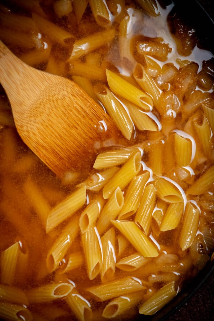 add the beef broth and pasta, and bring to a boil over high heat. 