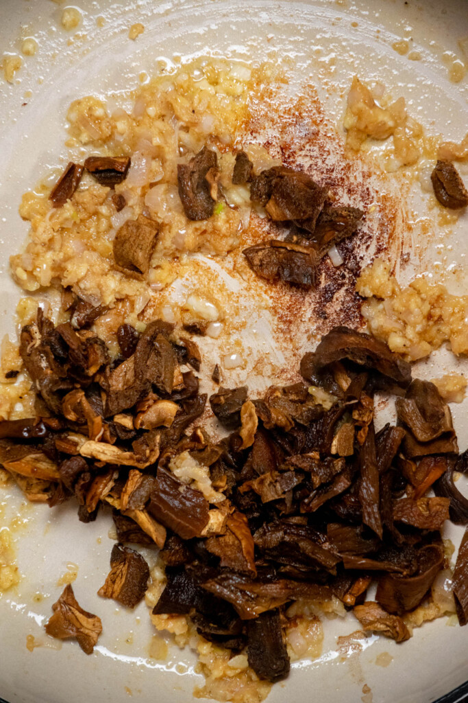 add the chopped porcini mushrooms, toss to coat, and cook for 1 minute 