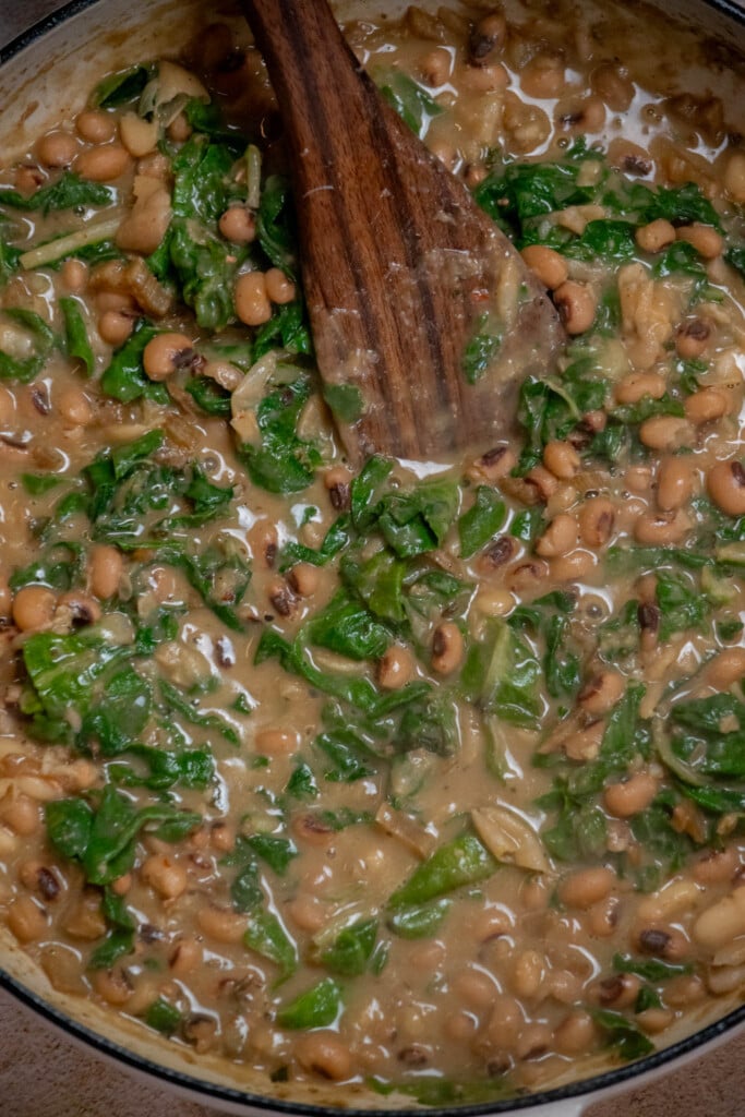 Cook 1-2 minutes, until chard leaves are wilted and cheese is melted