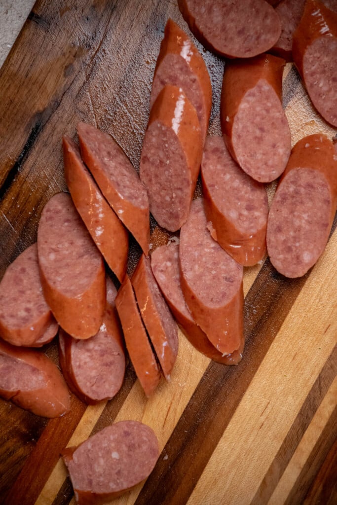 Slice the sausage on a diagonal (bias) to create more surface area for browning 