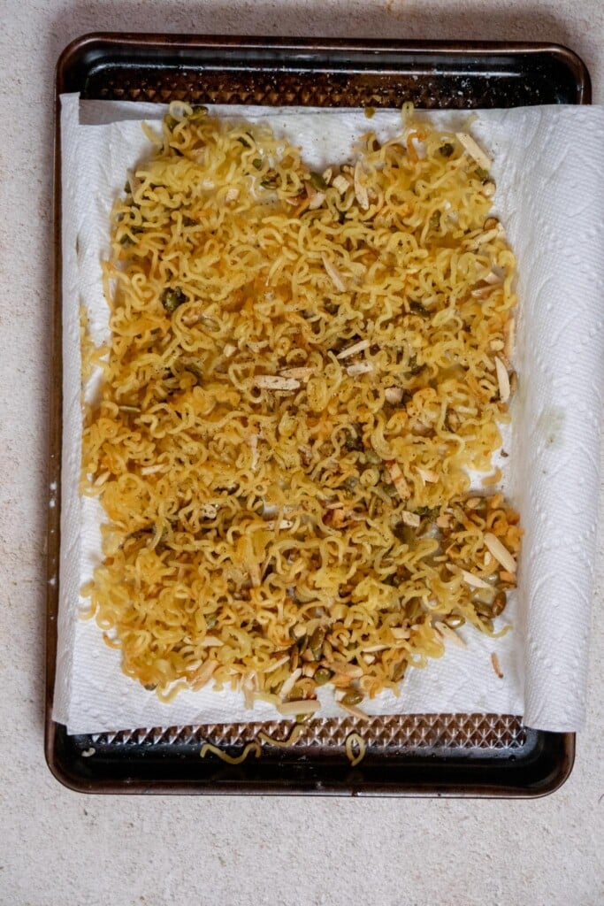 Immediately transfer them to a paper towel lined sheet pan to drain. 