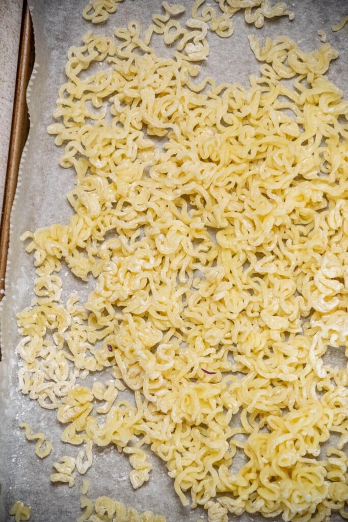 Before frying, toss the dried ramen in cornstarch with your hands to ensure it's fully dry. This also helps it get extra crunchy. 