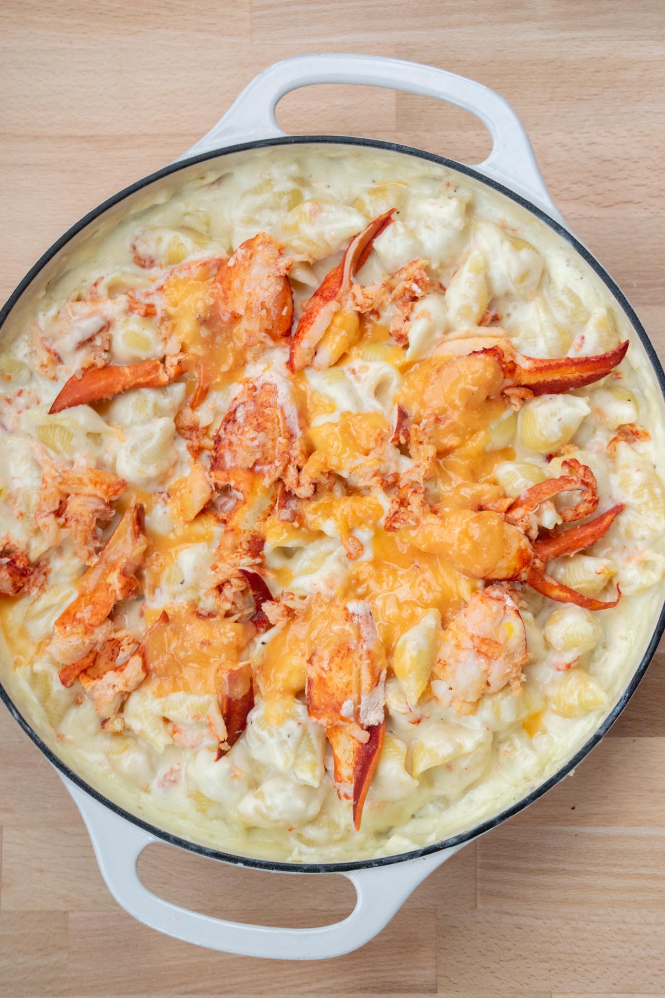 Thickened sauces added to the top of the lobster macaroni and cheese.