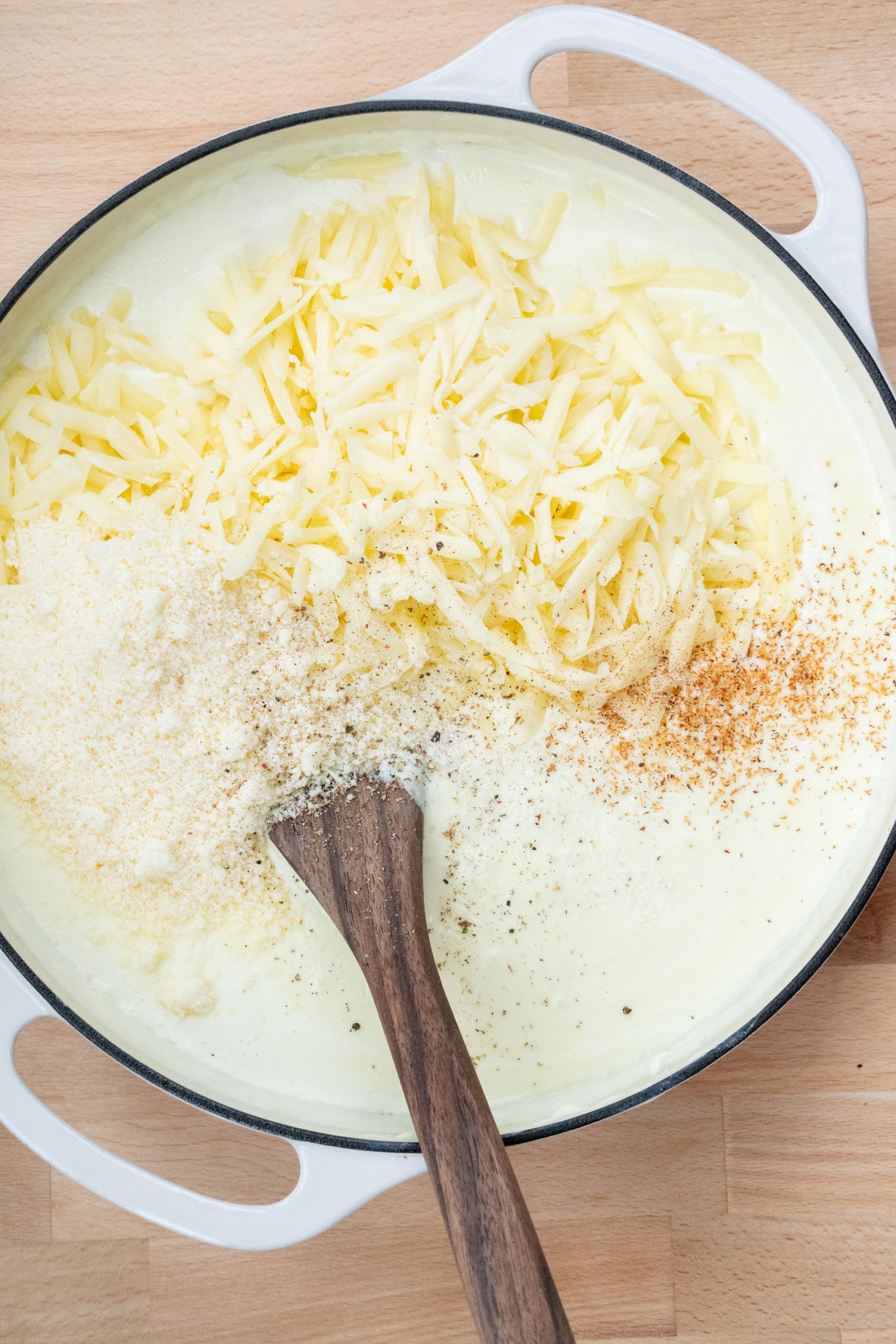 Spices and other cheeses added to the lobster macaroni and cheese sauce.