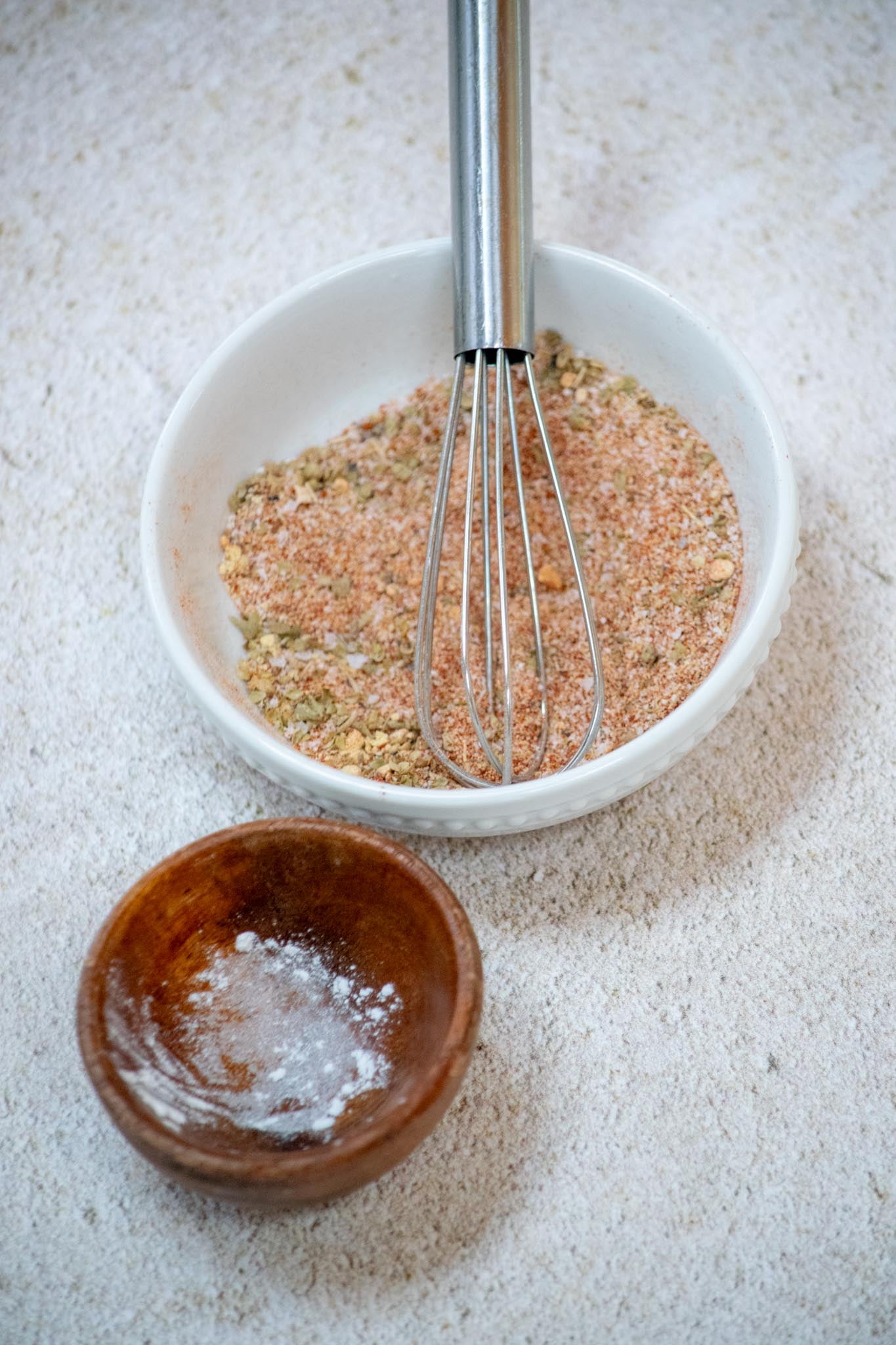 Bowl of seasonings mixed on the counter.